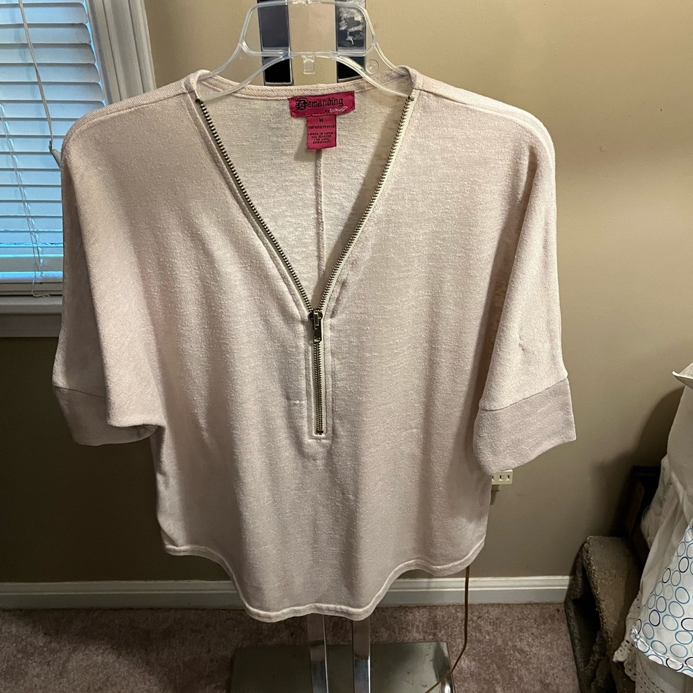 Demanding by Say what?  Big zippered tee